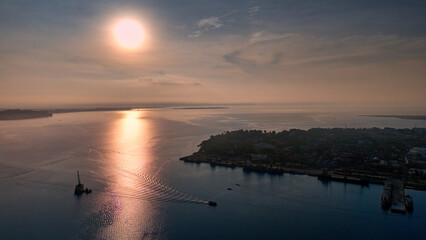 Sunrise over the port of Tacloban in Leyte Philippines and the San Juanico Strait