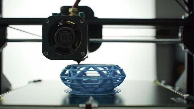 3D Printer Creating Blue Geometric Object, Additive Manufacturing Process