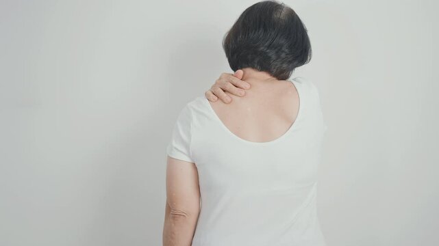 Elderly Woman having Shoulder Pain for Muscle Inflammation and Sprain, Myofascial ache syndrome and Fibromyalgia, Shoulder Myalgia, Scapular Tightness, Cervical Spine, Rheumatism and Health care