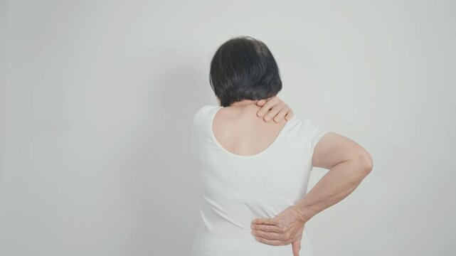 Elderly woman having back body ache for concepts of Back Muscle Strain, Piriformis Syndrome, Low Back Pain, Lumbar Disc Degeneration, Herniated, Osteoporosis, Spinal Compression and Health care