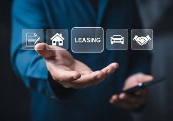 Leasing business concept, Businessman showing LEASING icon on virtual screen. Contract management, analyze leasing options and finance agreements for assets and vehicles.