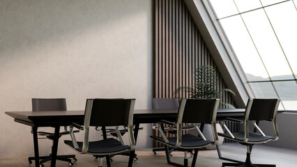 Black long table and swivel chairs with sloped roof window in a meeting room in office or company.