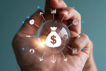 Hand holding a glass sphere with a money bag and financial icons surrounding it
