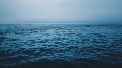 Fototapeta premium Blue sky over calm sea. Blue sea and sunny sky on horizon over calm water