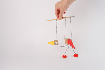 Creative handmade bird puppet toy from recycled materials for DIY blogs, craft tutorials, educational content, toy brands, children workshops, art and eco-friendly product promotion