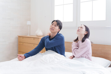 睡眠後も疲労がある夫婦