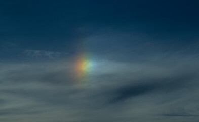 Iridescent clouds: sunlight diffraction by tiny ice crystals in high-altitude clouds creates...