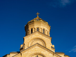 The Holy Trinity Cathedral. Tsminda Sameba with the cross on the top of the Georgian Orthodox...