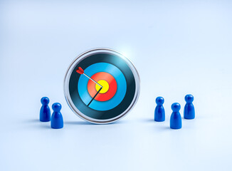 Stakeholder, business connection, cooperation, teamwork and team building concept. Big 3d modern target icon and human doll figure group as businessman standing together, isolated on blue background.