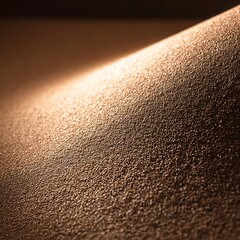 Textured Sand Dune Illuminated by Light