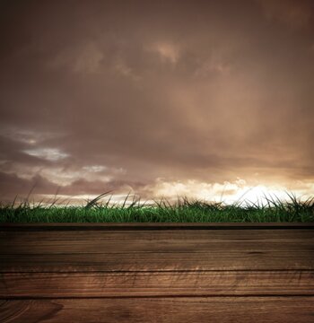 Fototapeta Wooden planks against cloudy sky