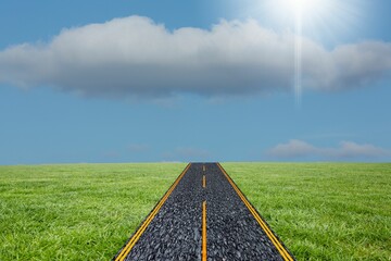Two-lane asphalt road is running through vector grassland, with yellow lines, clouds and sunbeam
