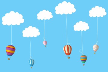 Hot air balloons hanging from clouds