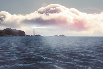 Flat design is showing coastal waters with white lighthouse casting beam over waves with pink cloud