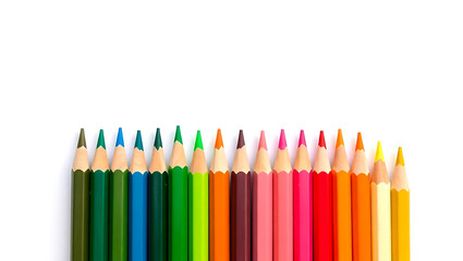 A row of sharpened colored pencils arranged in a spectrum of colors