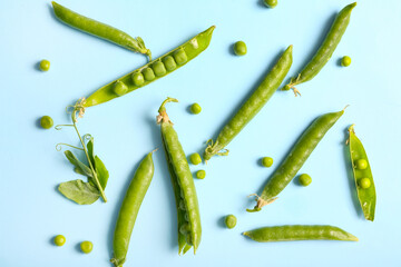 Green peas on blue background