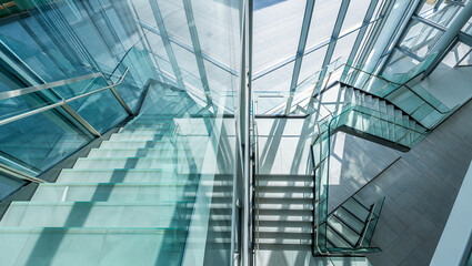 Modern Glass Staircase in Sleek Contemporary Office Building, High Angle View