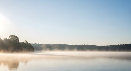 Fototapeta premium Serene Sunrise Mist over Calm Lake and Forest