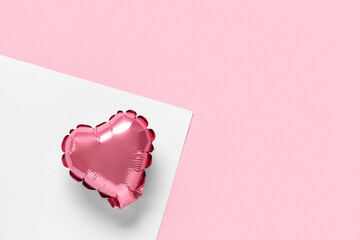 Air balloon in shape of heart on colorful background. Valentine's Day celebration
