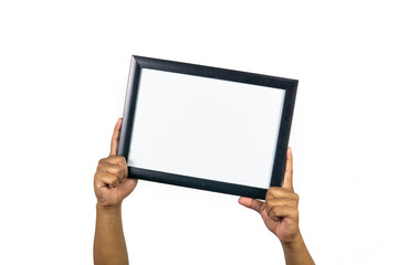Man's hand holding mockup photo frame isolated on white background