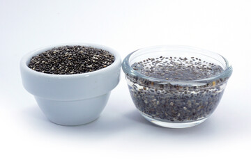Chia seeds are in a bowl placed on a white background. Chia seeds are high in omega 3, rich in fiber, good for the digestive system, have nutrients that are essential for building strong bones.