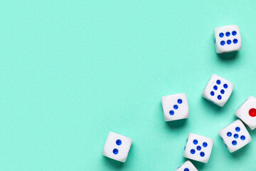 White game dices on turquoise background