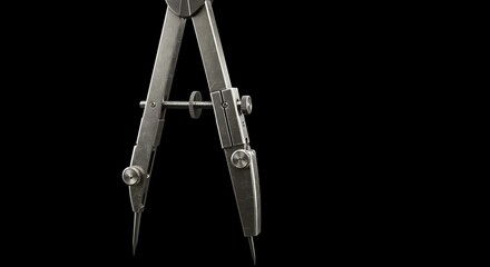 Metal Compass on Dark Background