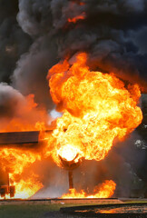 Vertical Horizon Firefighter Rescue training in fire fighting extinguisher. Firefighter fighting...