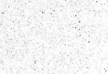 Fine speckled ink splatter texture with random grunge spots and soft scattered dust. High-resolution vector background for retro or print designs.
