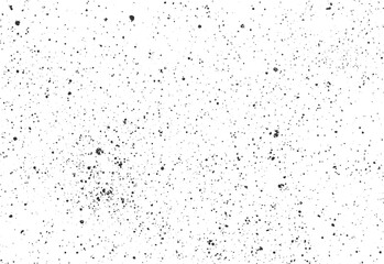 Grunge ink spray texture with concentrated splatter cluster. Urban vector background with scattered paint droplets on white.