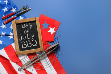 USA flag, chalkboard with text 4TH OF JULY BBQ and barbecue utensils on blue background....