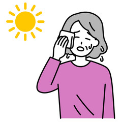 熱中症になる年配の女性