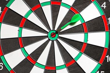 Board with dart, closeup view