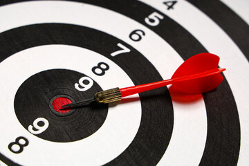Board with dart, closeup view