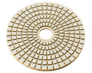 Circular diamond polishing pad for grinding stone surfaces on a transparent background