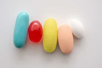 Colorful medicine pills tablet on white background