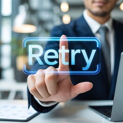 businessman pressing digital retry button in office