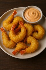 Crispy coconut shrimp served golden with sweet chili dipping sauce