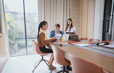 group of business people LGBTQ+ Diverse Team meeting collaborating new project in office