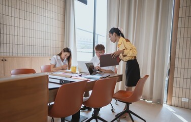 group of business people LGBTQ+ Diverse Team meeting collaborating new project in office