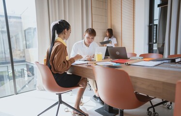 group of business people LGBTQ+ Diverse Team meeting collaborating new project in office