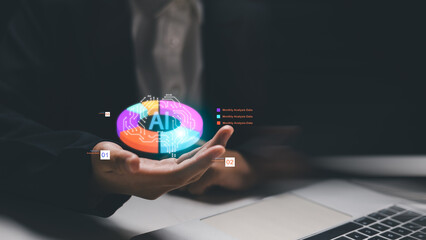 Businessman holding digital AI analytics interface with colorful charts. Artificial Intelligence concept for big data, technology innovation, machine learning, and future business strategy.