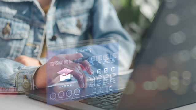 Person using laptop with futuristic E-learning interface, showing online lessons, audiobooks, and certifications, symbolizing digital education, remote learning, and smart training systems.