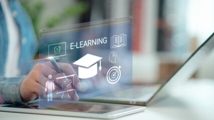 Person using digital pen and laptop with virtual e-learning interface, featuring education icons like graduation cap, book, and video, representing online learning, remote study, and digital education