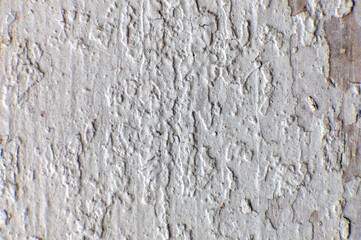 Naklejka premium Close-up of a plastered wall with a strong structure.