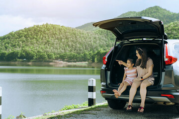Summer vacation happy mother and daughter having fun. The concept of family on vacation and travel.