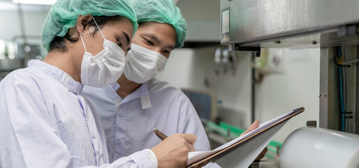 Inspector of food or beverages inspection about quality control food or beverages on warehouse...
