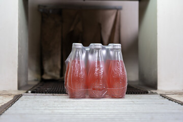Factory of food or beverages, juice and water bottle, food or beverages on warehouse before send product to the customer. Quality control or assurance, Good standard