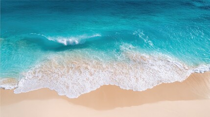 Aerial view of turquoise waves breaking on white sand shore in a tropical paradise with space for text