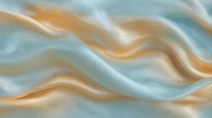 Obraz premium Abstract waves of metallic gold shimmering over blue silk-like background with elegant movement